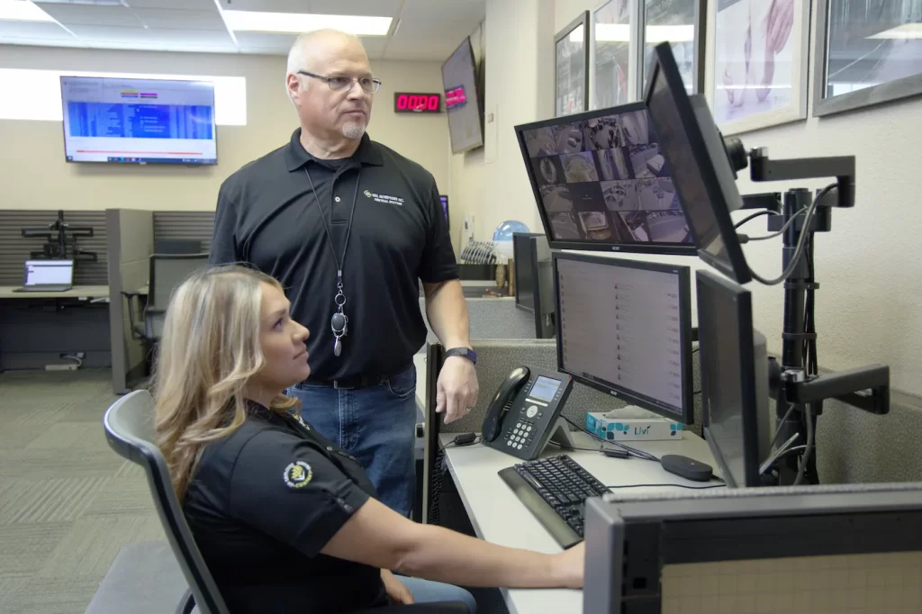Central Station workers monitoring video surveillence cameras.